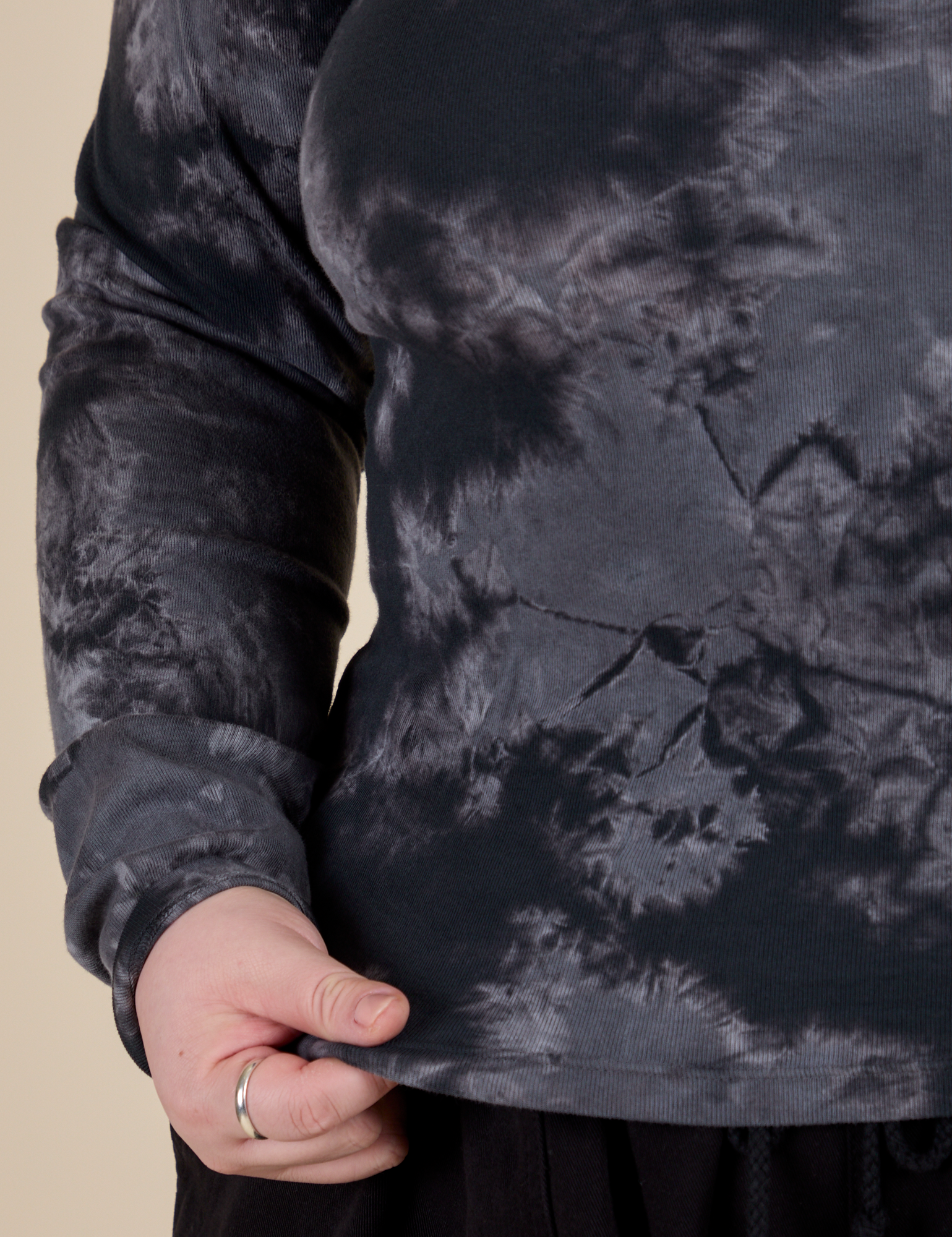 Close up of Long Sleeve Baby Tee in Black Magic Waters on Ashley