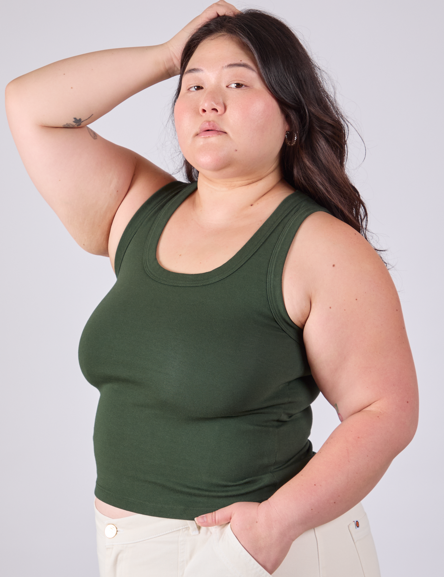 Angled front view of Tank Top in Swamp Green on Ashley