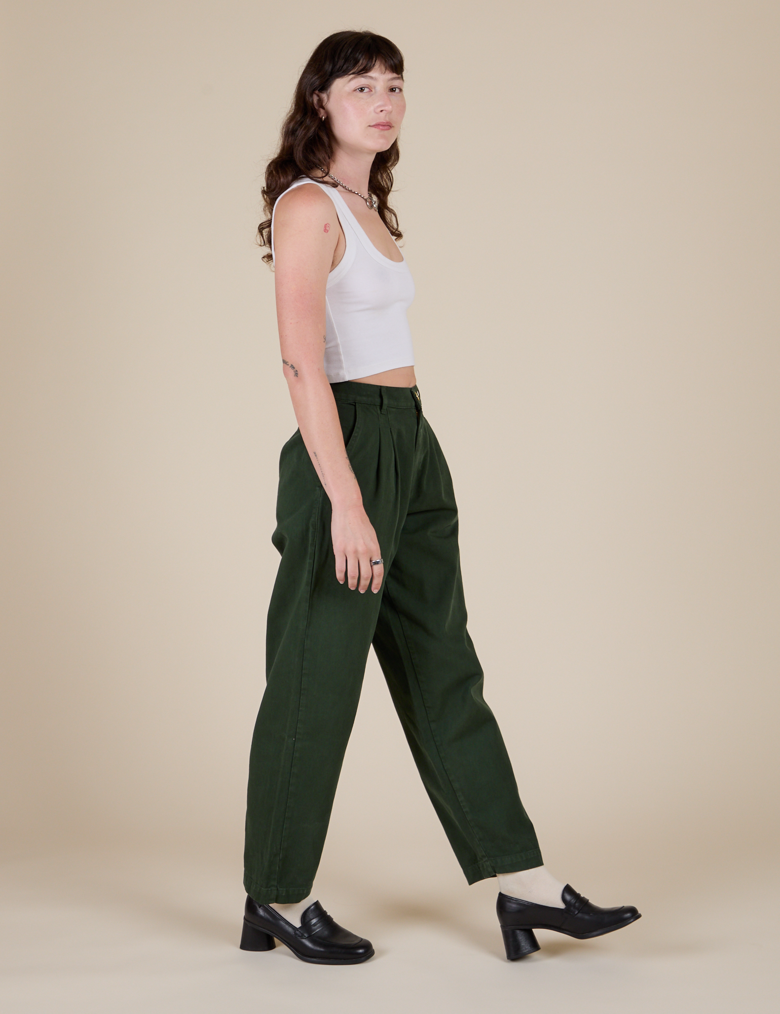 Side view of Heavyweight Trousers in Swamp Green and Cropped Tank in vintage tee white