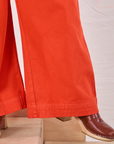 Action Pants in Chili Red pant leg close up on Ashley