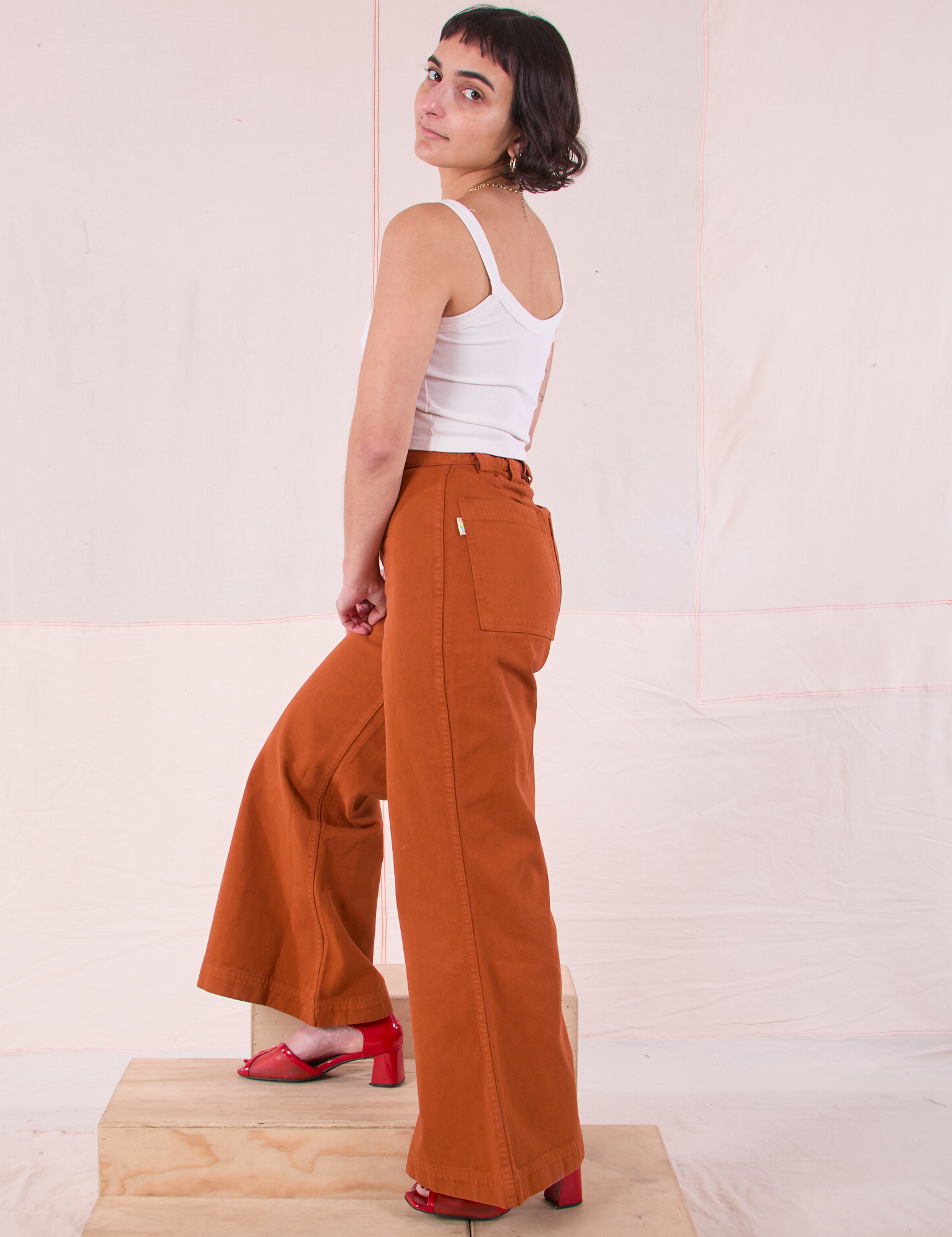 Side view of Bell Bottoms in Burnt Terracotta on Soraya