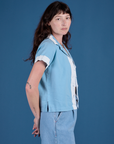 Painted Pantry Button-Up in Baby Blue side view on Alex