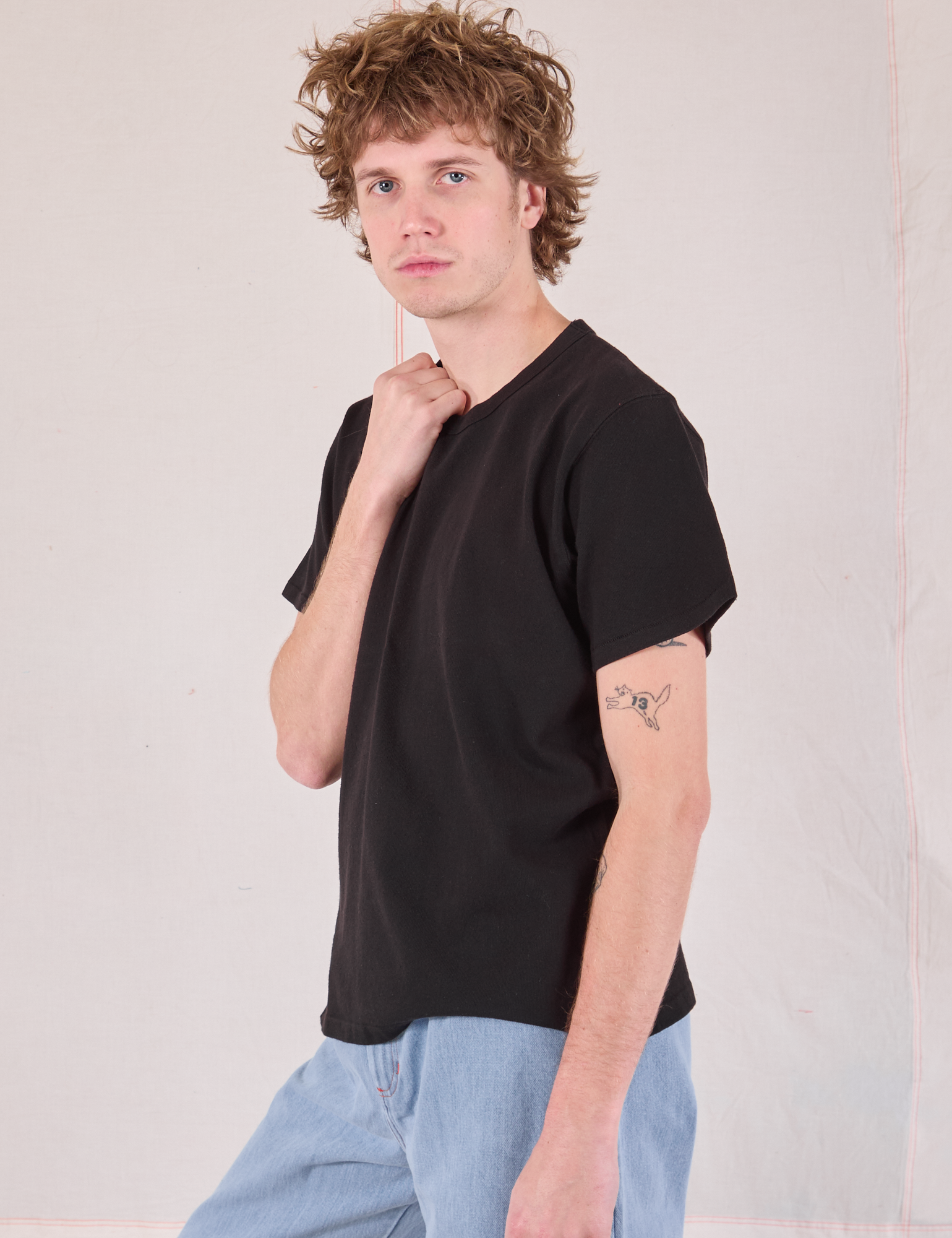 Burly Tee in Basic Black side view on Quinn