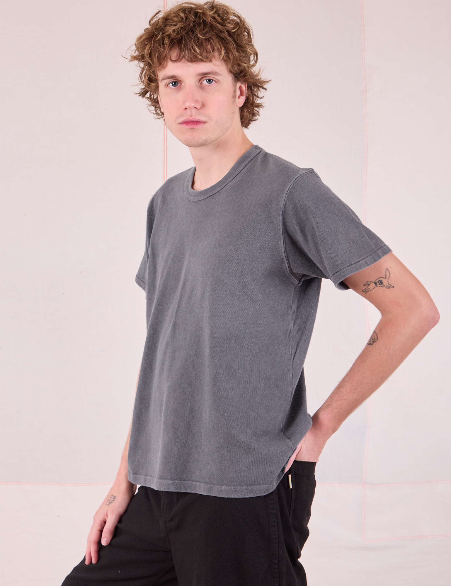 Burly Tee in Washed Grey angled front view on Quinn