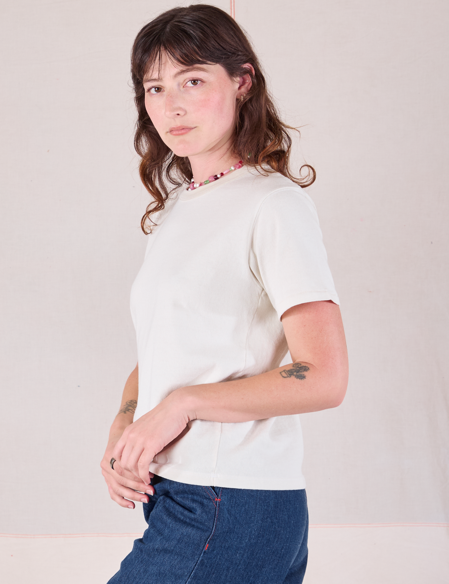 Burly Tee in Vintage Tee Off-White angled front view on Alex