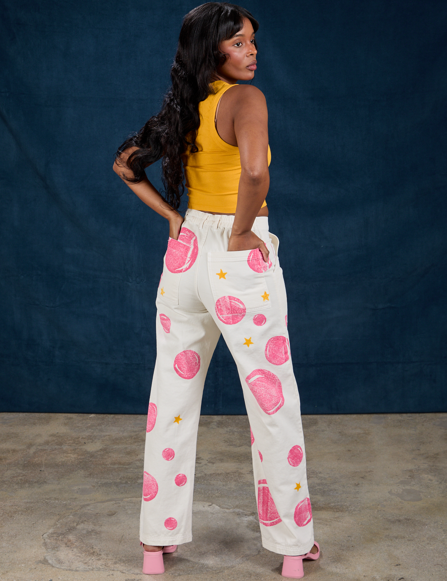 Back view of Paintstamped Work Pants in Bubblegum on Kandia