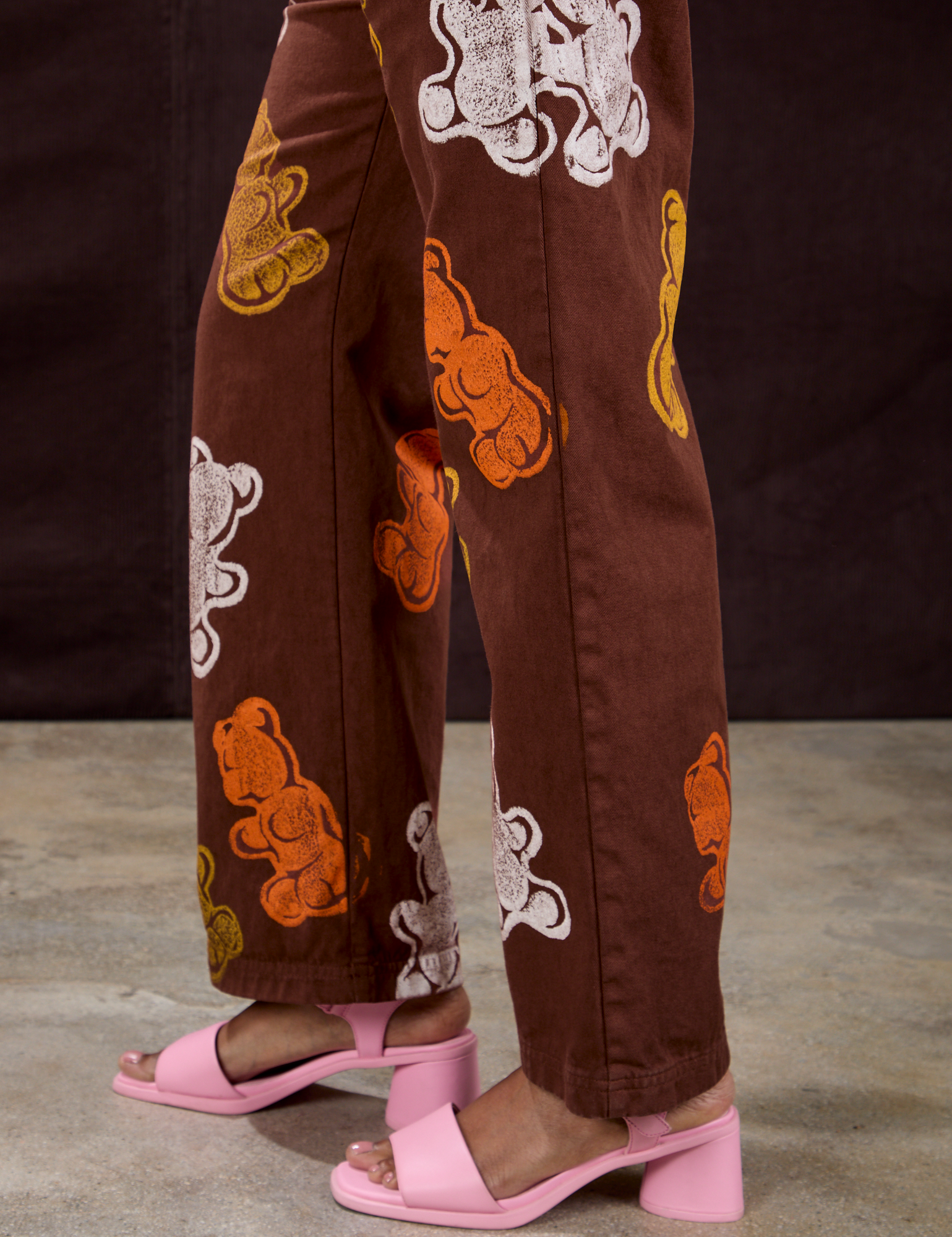 Gummy Bear Paintstamped Work Pants in Fudgesicle Brown pant leg close up on Kandia
