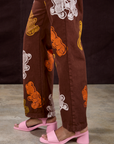 Gummy Bear Paintstamped Work Pants in Fudgesicle Brown pant leg close up on Kandia