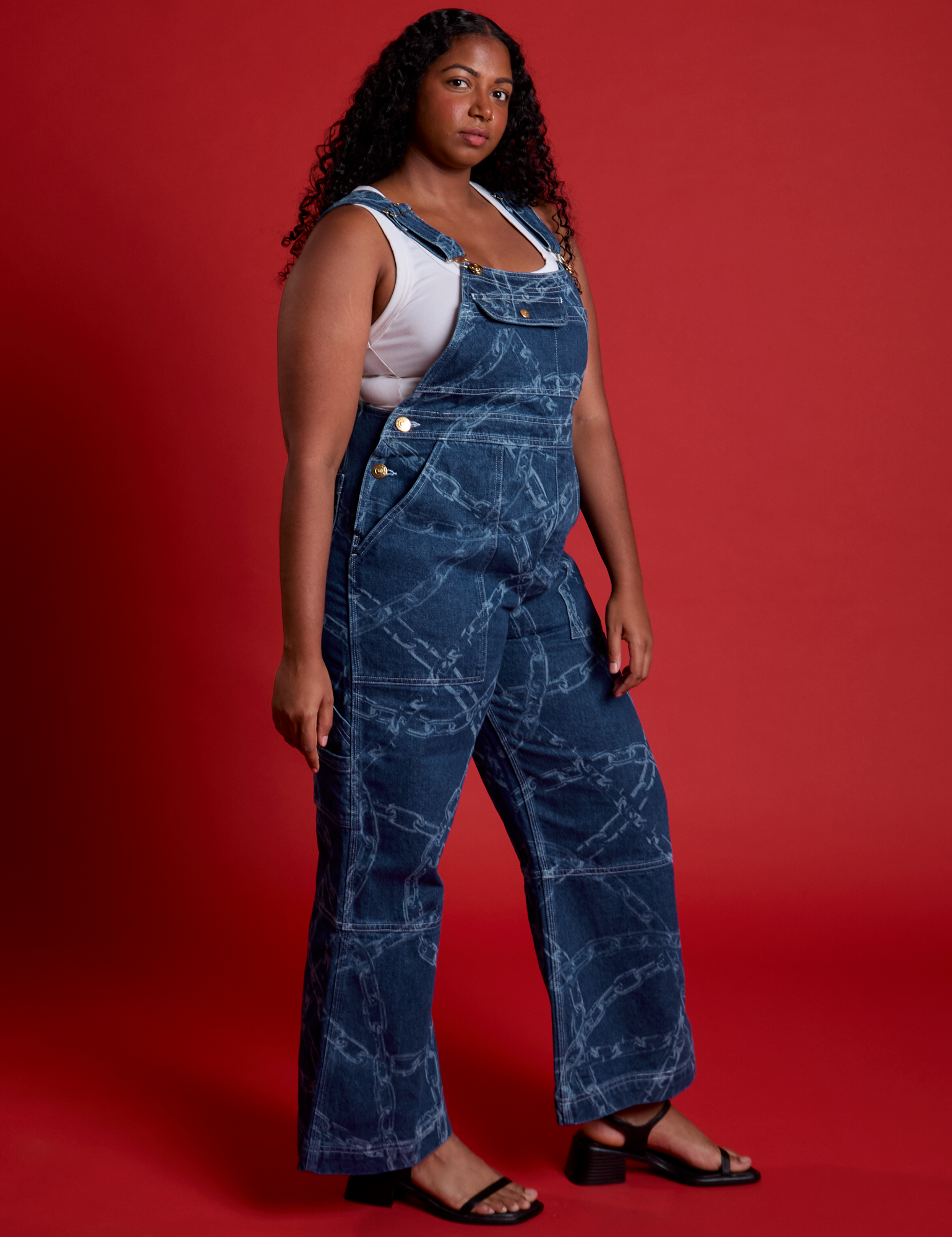 Angled front view of Carpenter Overalls in Chain Link on Meghna
