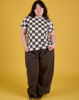 Ashley is wearing Checker Organic Tee in Espresso Brown and Drop Pocket Cargo Pants in Espresso Brown