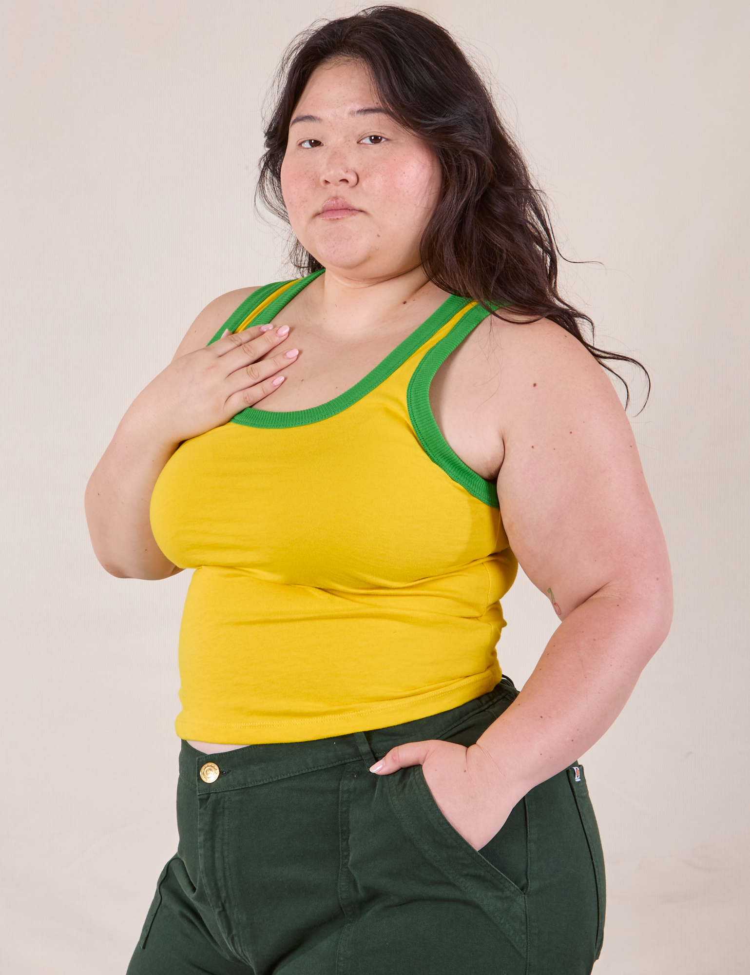 Colorblock Cropped Tank in Golden Yellow angled front view on Ashley
