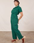 Side view of Short Sleeve Jumpsuit in Hunter Green worn by Tiara