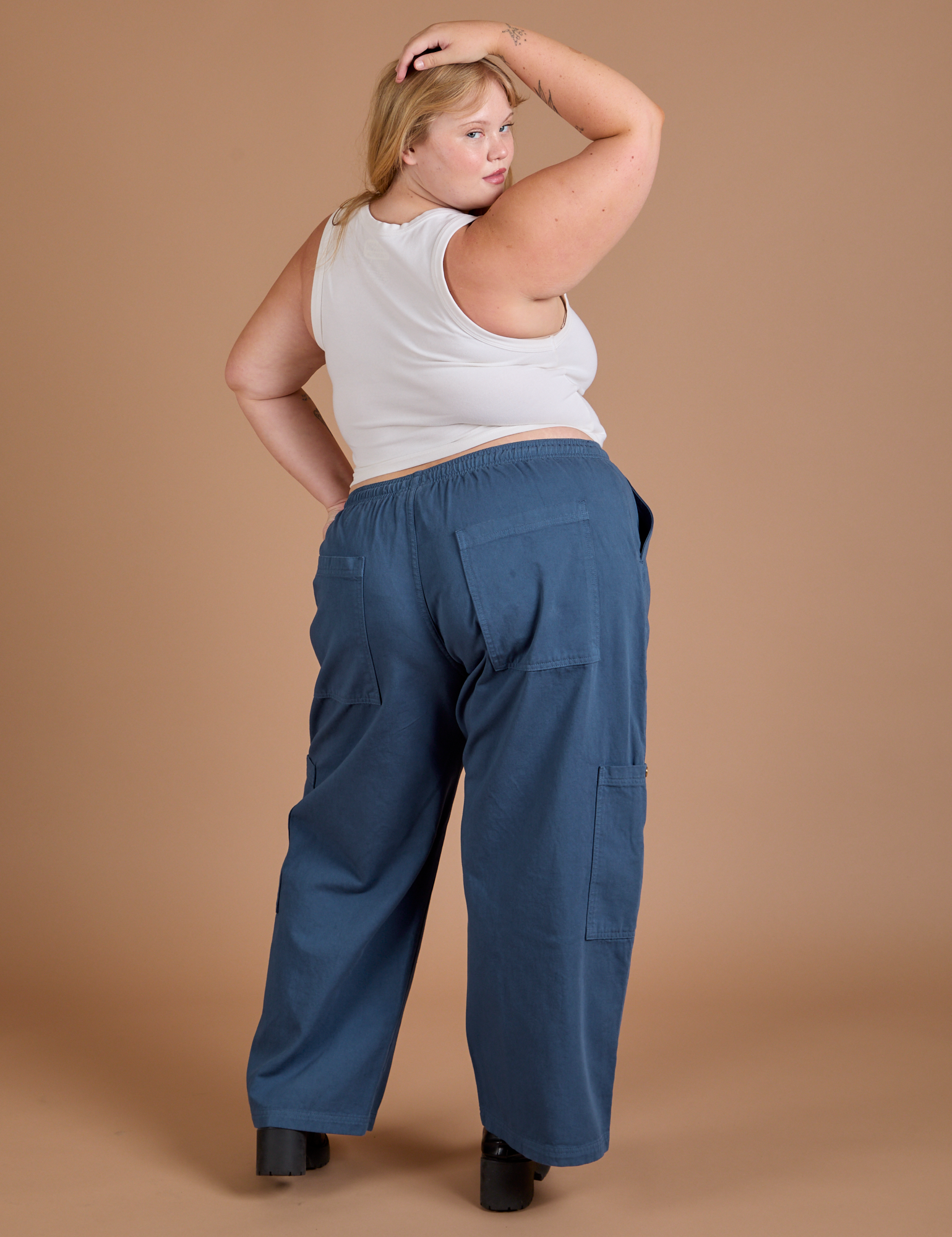 Back view of Drop Pocket Cargo Pants in French Blue and Cropped Tank in vintage tee white