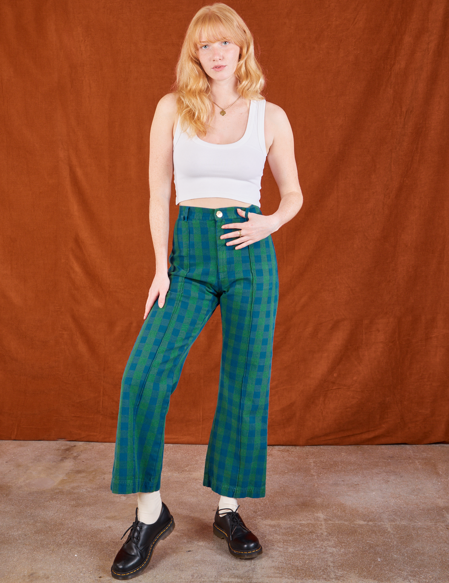 Margaret is wearing Gingham Western Pants in Green and a Cropped Tank in vintage tee off-white