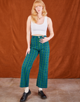 Margaret is wearing Gingham Western Pants in Green and a Cropped Tank in vintage tee off-white