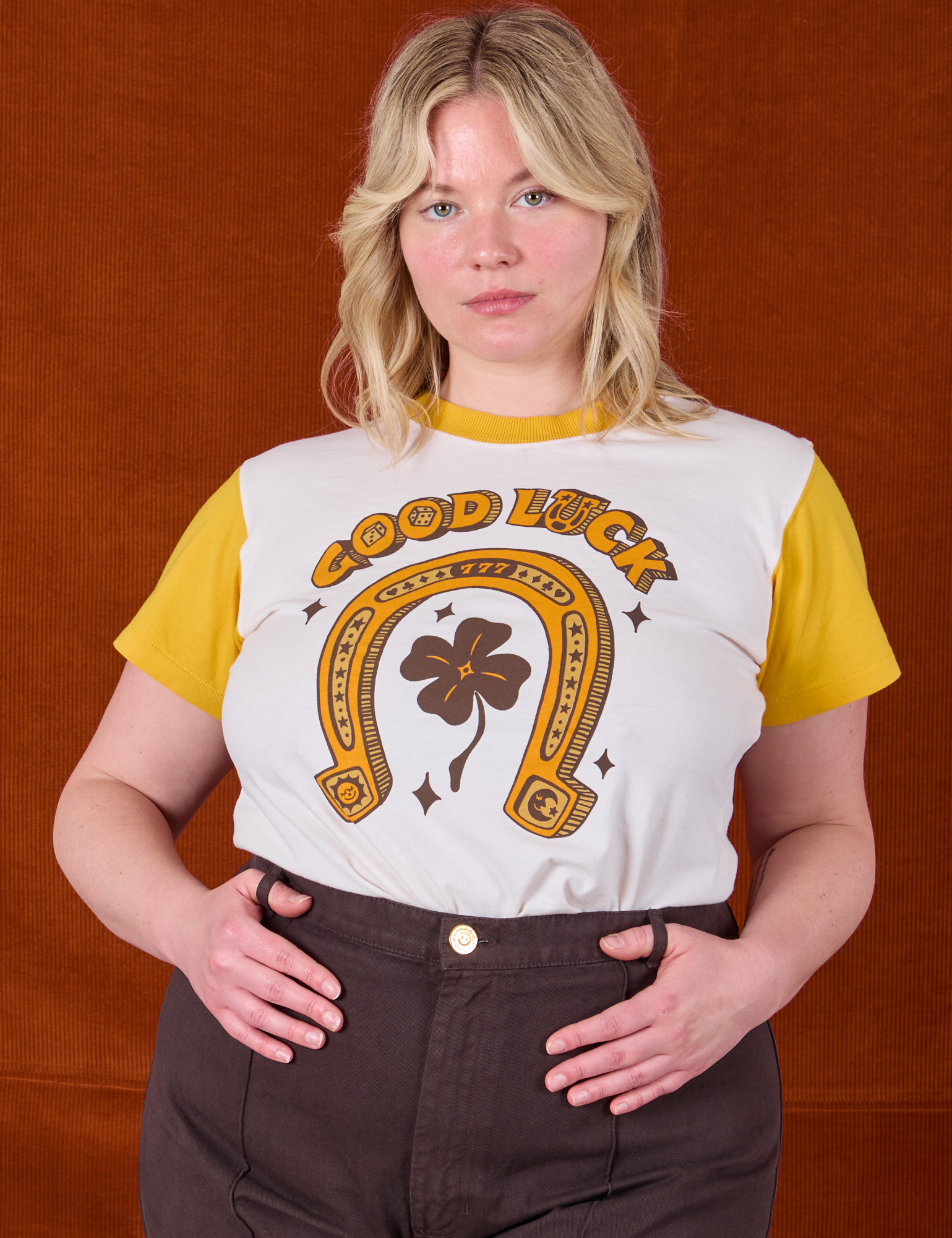 Lish is wearing Golden Horseshoe Organic Tee