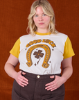 Lish is wearing Golden Horseshoe Organic Tee