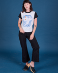Alex is wearing Vintage Tee in California Girl paired with black Western Pants