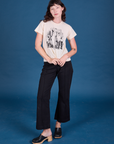 Alex is wearing Vintage Tee in Group Show paired with black Western Pants