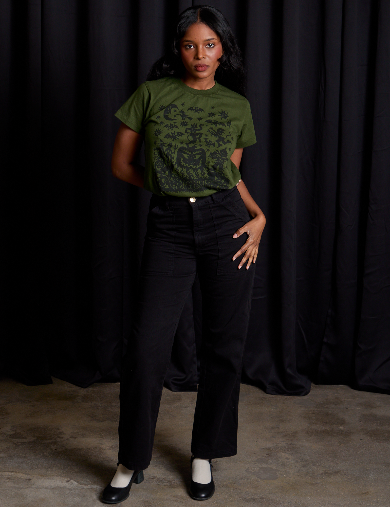 Kandia is wearing Vintage Tee in Papercut paired with black Work Pants