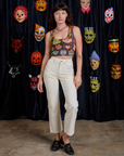 Alex is wearing Cropped Tank Top in Halloween Masks and vintage tee white Work Pants