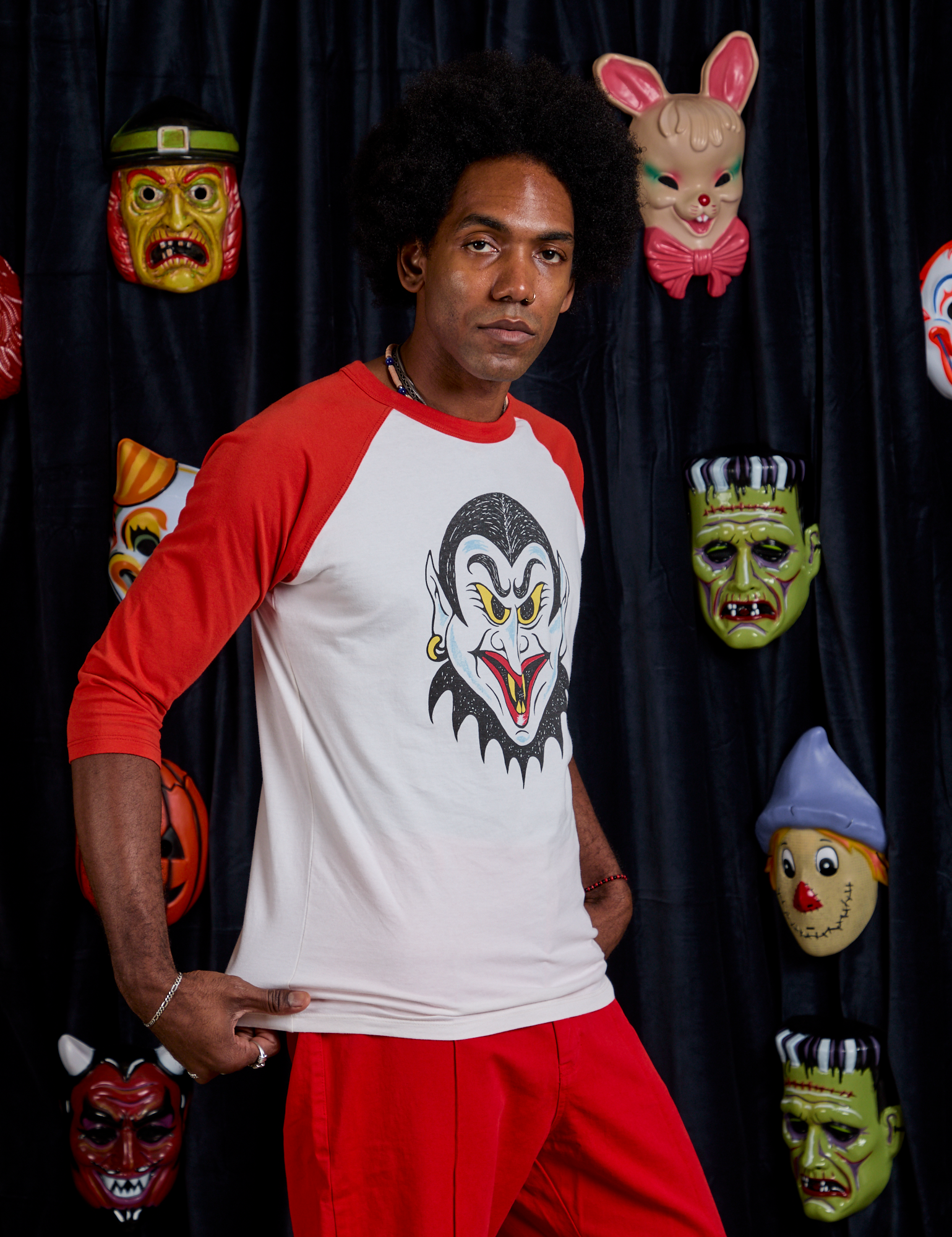 Raglan Tee in Dracula angled front view on Jerrod