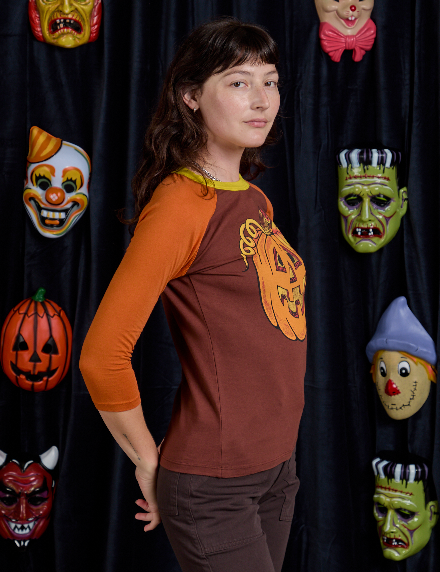 Raglan Tee in Jack-O-Lantern side view on Alex
