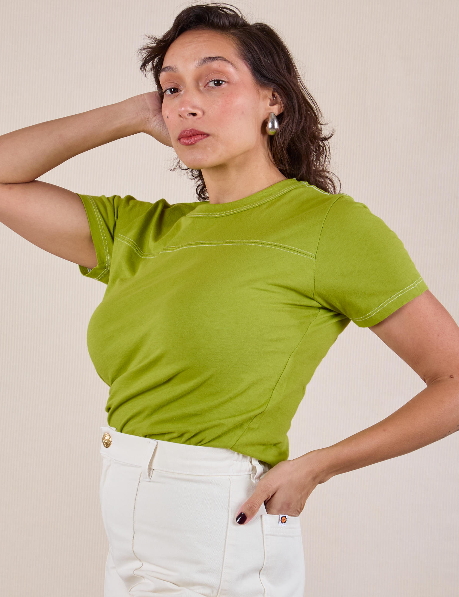 JV Tee in Gross Green angled front view on Tiara