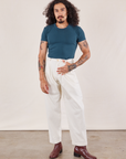 Jesse is wearing Baby Tee in Lagoon and vintage tee off-white Heavyweight Trousers