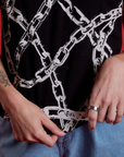 Chain Link Vintage Tee in Basic Black bottom close up on Alex
