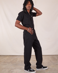 Side view of Long Jumpsuit in Basic Black on Jerrod