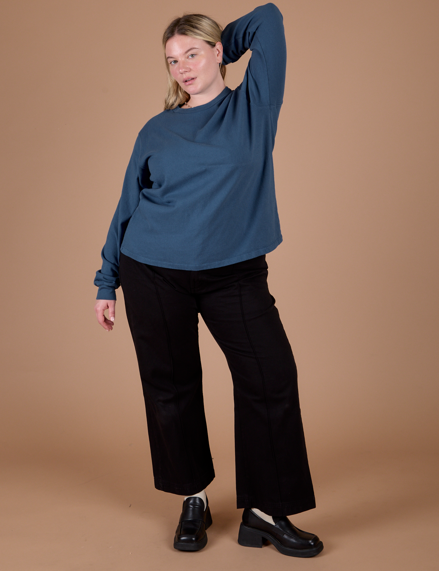 Lish is wearing Long Sleeve Burly Tee in French Blue and black Work Pants
