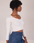 Angled front view of Long Sleeve V-Neck Tee in Vintage Tee Off-White on Cheyann