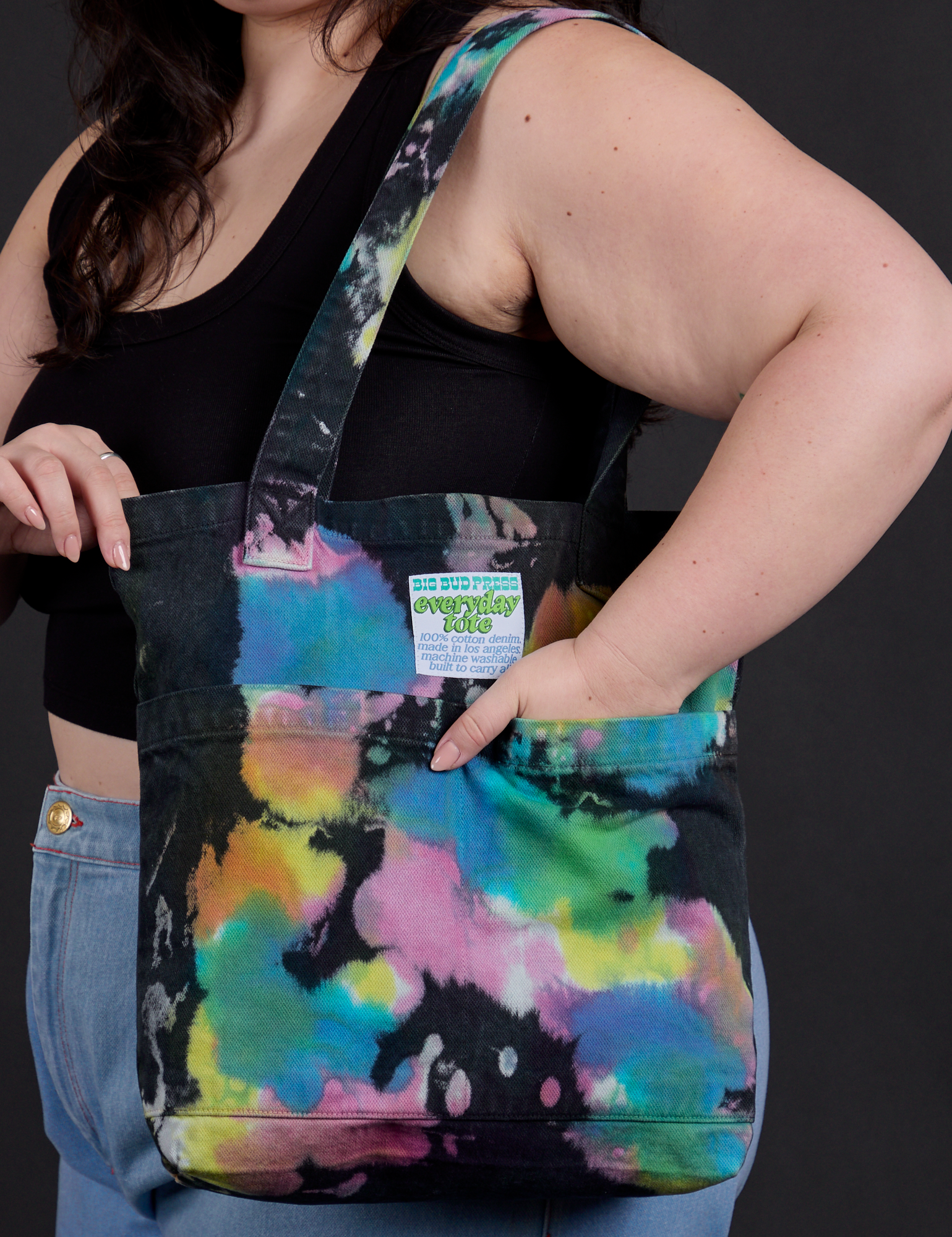 Everyday Tote in Rainbow Magic Waters worn over shoulder of model