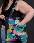 Everyday Tote in Rainbow Magic Waters worn over shoulder of model