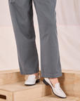 Mid-Rise Pleated Trousers in Slate Grey pant leg close up on Alex