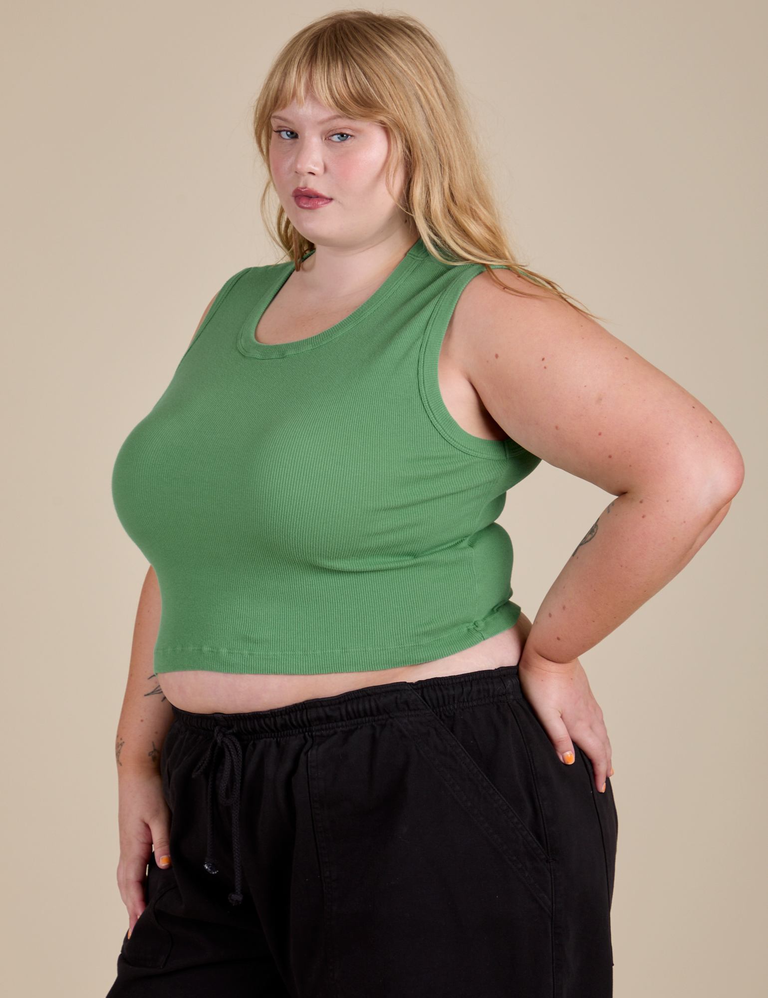 Muscle Tee in Seafoam Green angled front view on Juliet