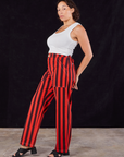 Side view of Black Stripe Work Pants in Mustang Red and Cropped Tank in vintage tee off-white on Tiara