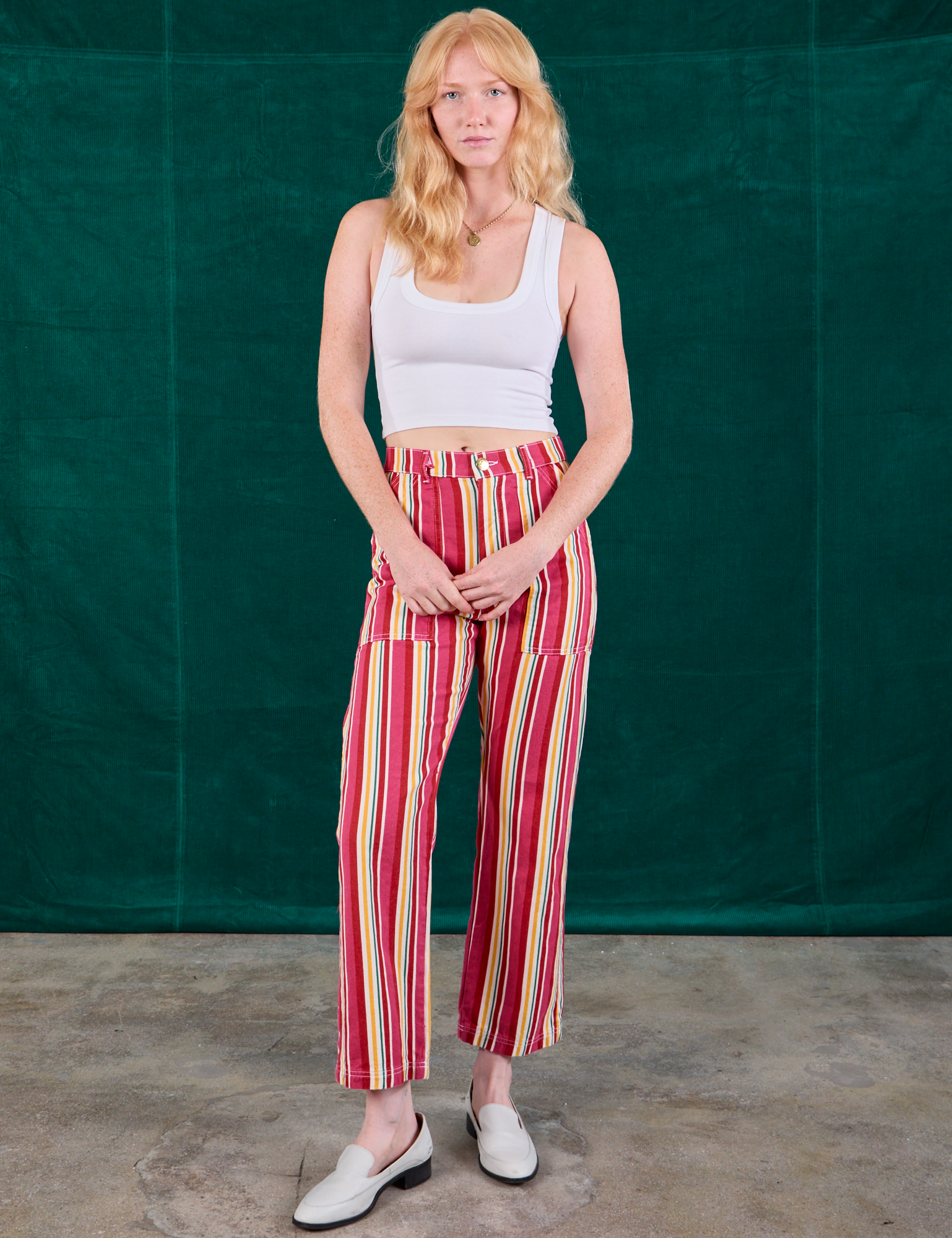 Margaret is wearing Stripe Work Pants in Cherry Candy and Cropped Tank in vintage tee off-white