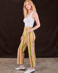 Side view of Stripe Work Pants in Vintage Sofa and Cropped Tank in vintage tee off-white on Margaret