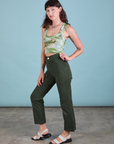 Side view of Cropped Tank Top in Ocean and Sky and swamp green Work Pants on Alex