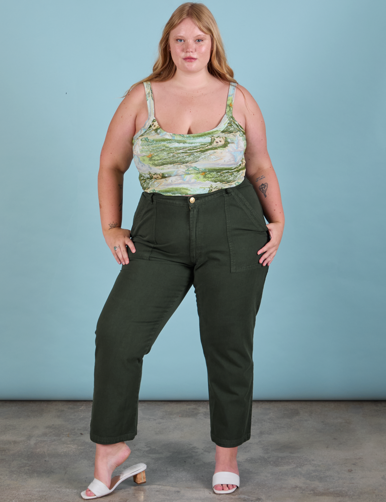 Juliet is wearing Ocean and Sky in Cami paired with swamp green Work Pants