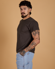 Angled front view of Organic Vintage Tee in Espresso Brown on Jesse