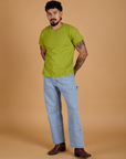 Organic Vintage Tee in Gross Green and light wash Carpenter Jeans on Jesse