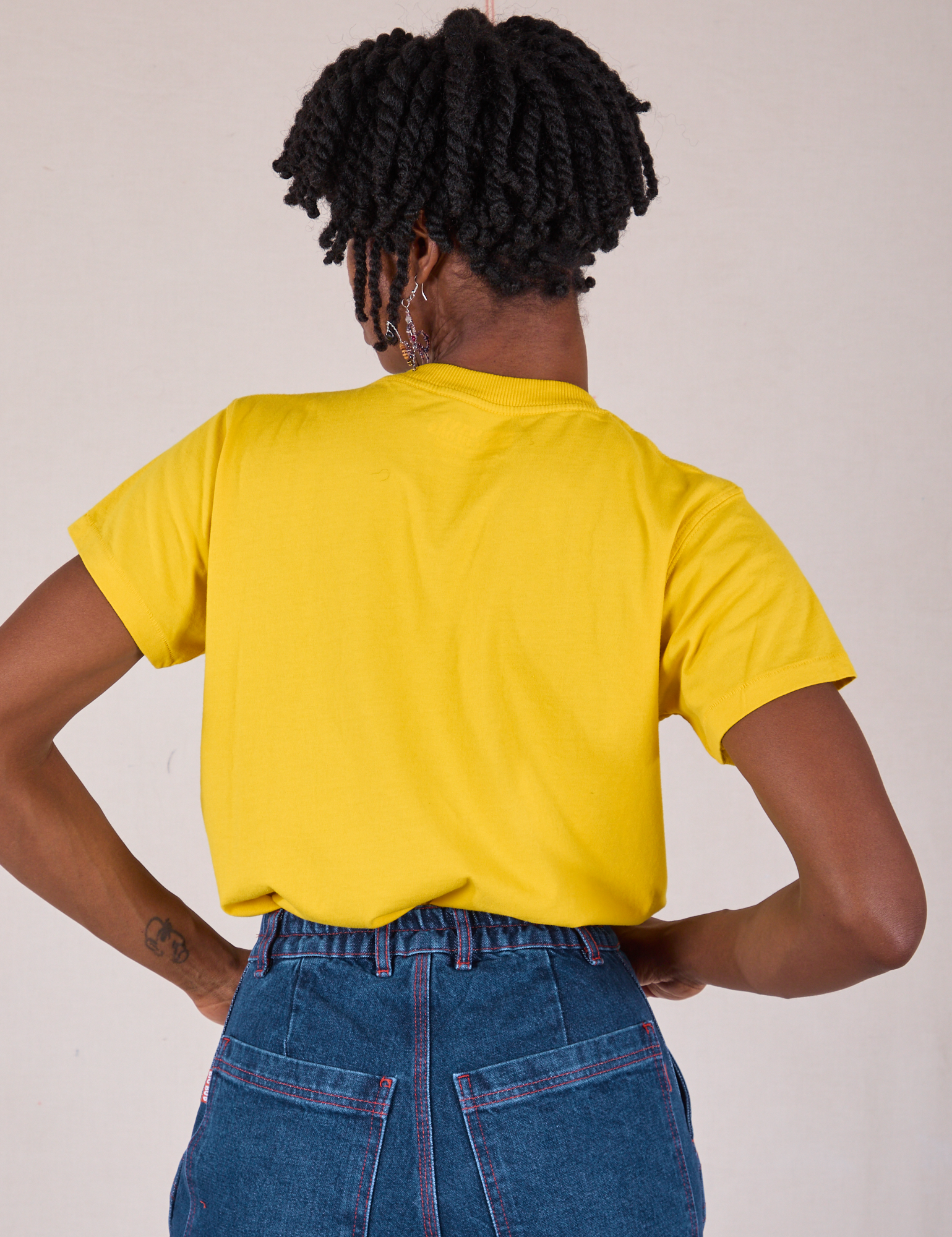 Organic Vintage Tee in Golden Yellow back view on Cheyann