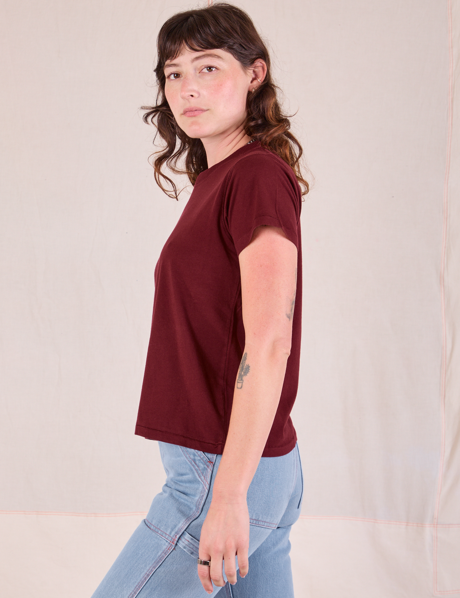 Organic Vintage Tee in Red Wine side view on Alex