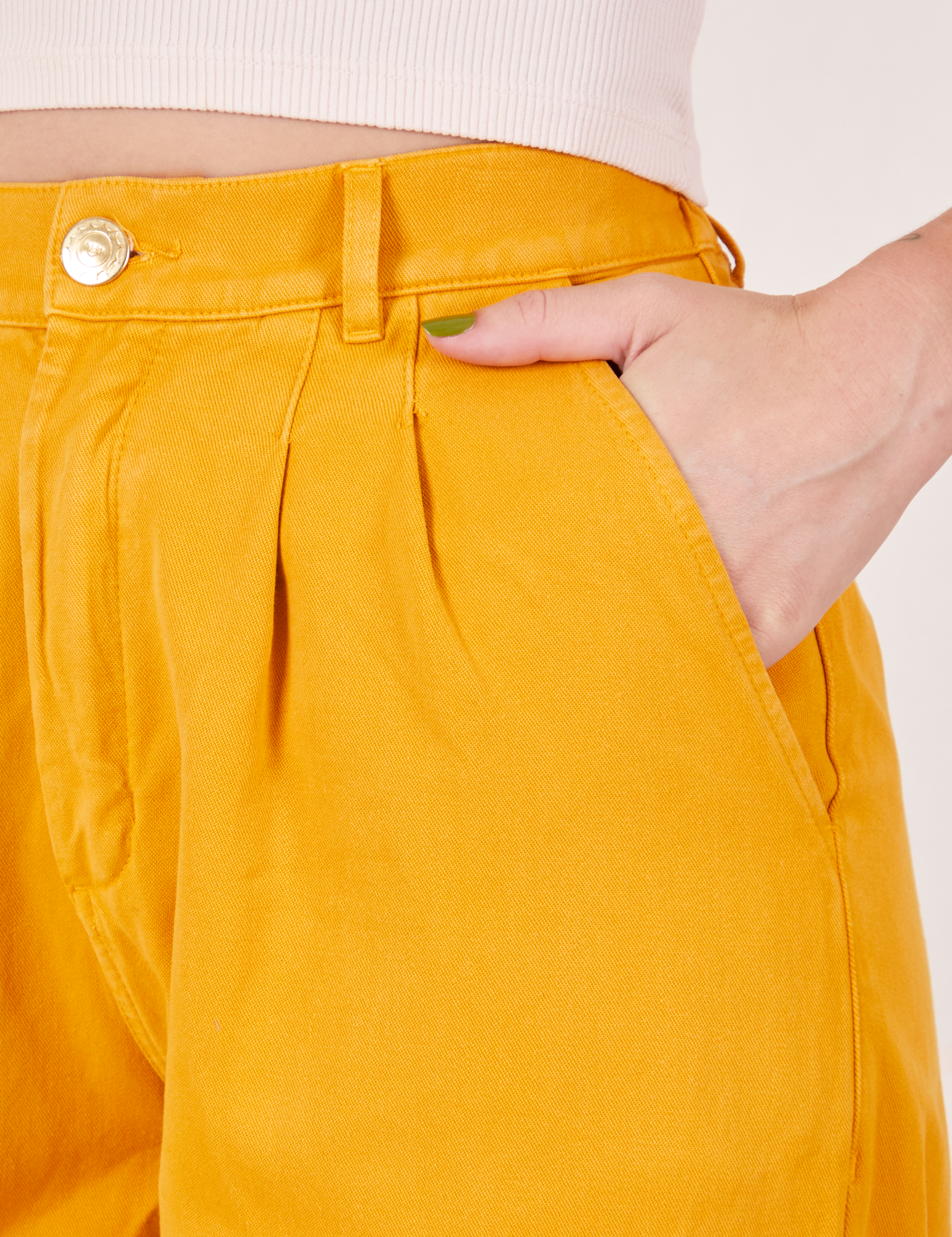 COLLUSION paperbag waist trousers with toggle in yellow | ASOS