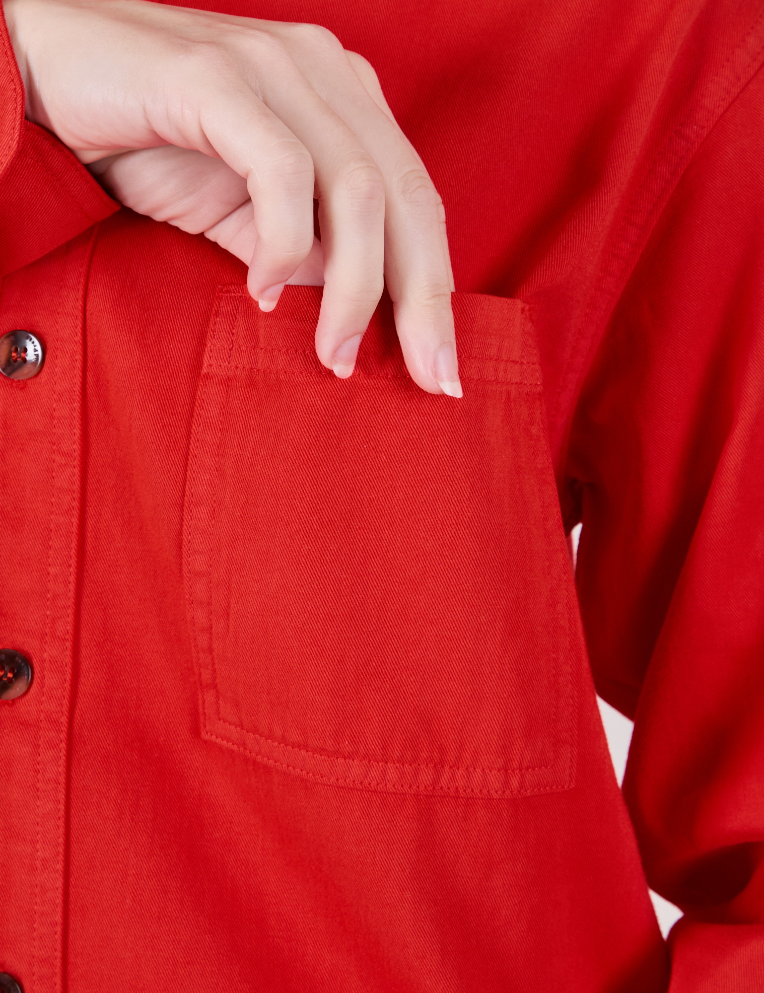 Twill Overshirt in Mustang Red front pocket close up