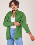 Jesse is wearing Oversize Overshirt in Lawn Green with a vintage off-white Cropped Tank Top underneath