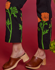 Paintstamped Work Pants in Poppy bottom pant leg close up on Alex